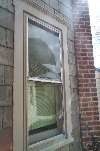 010418 HVAC & Ladder Blown Into Neighbor's Window